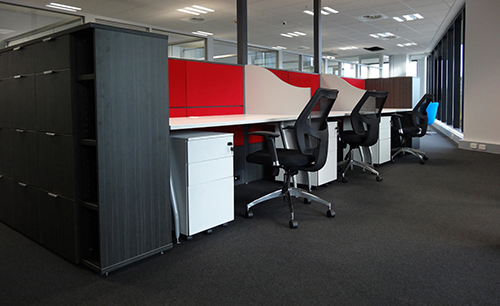 office workstation desks with red panels