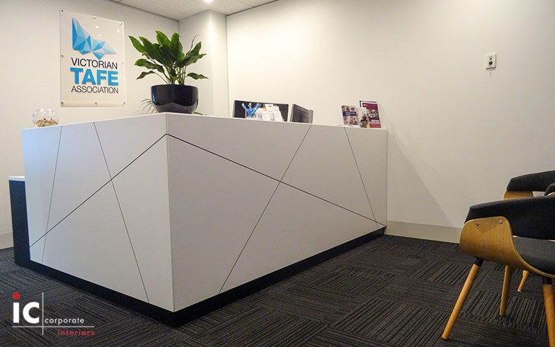 Axis corner reception desk in Laminex white satin gloss. Custom made to suit.